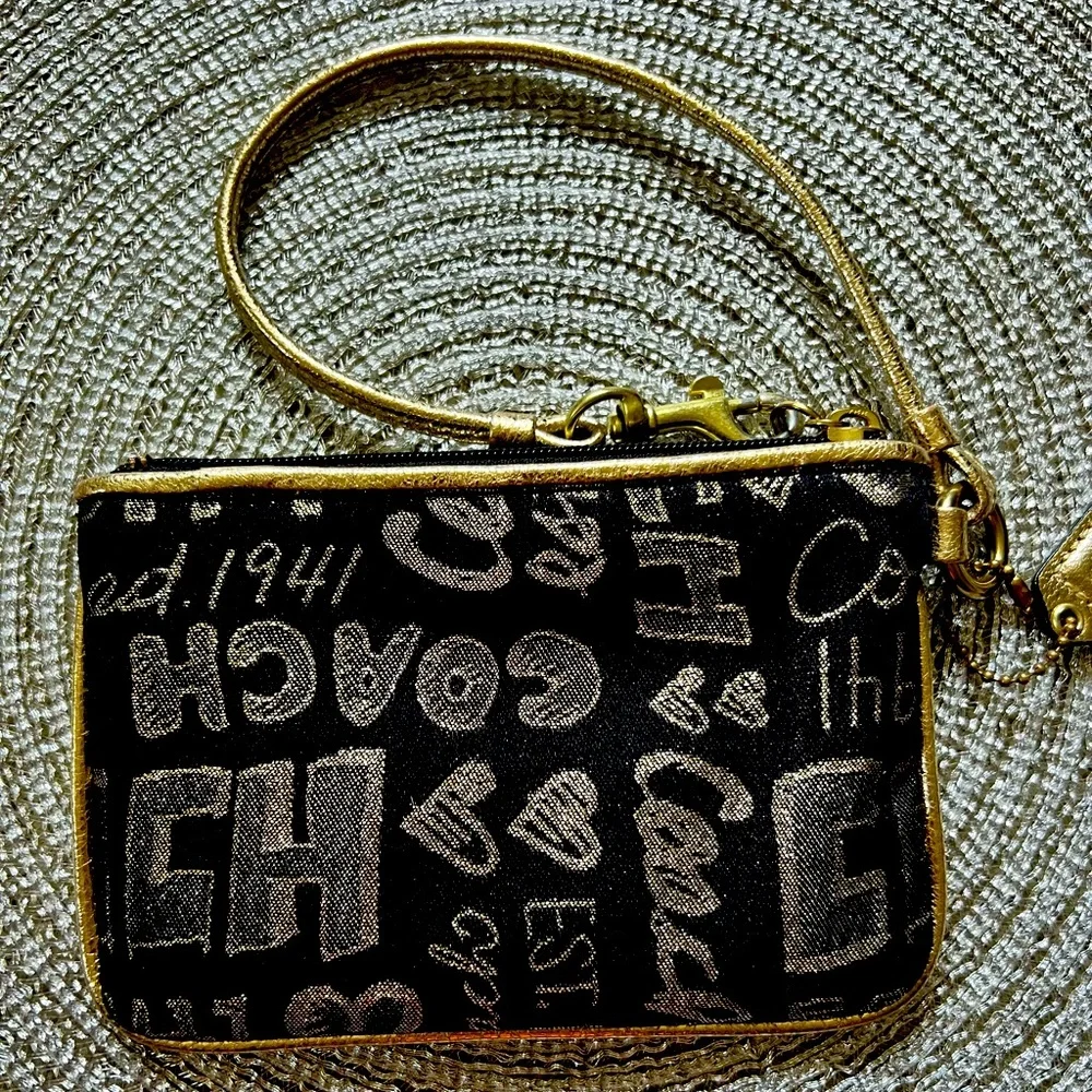 Coach Poppy Black and Gold Wristlet